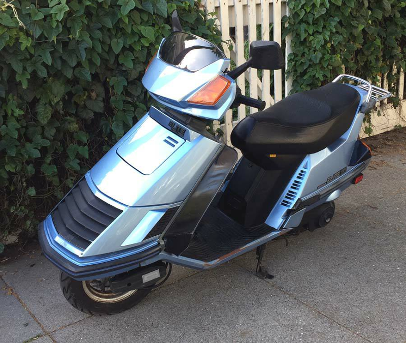 Illustration for article titled Honda's Elite 150 Is The Coolest Scooter With A Pop-Up Headlight